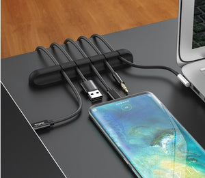 Silicone cable organizer for desk wire management
Magnetic plug holder for cables
Multi-port silicone wire organizer